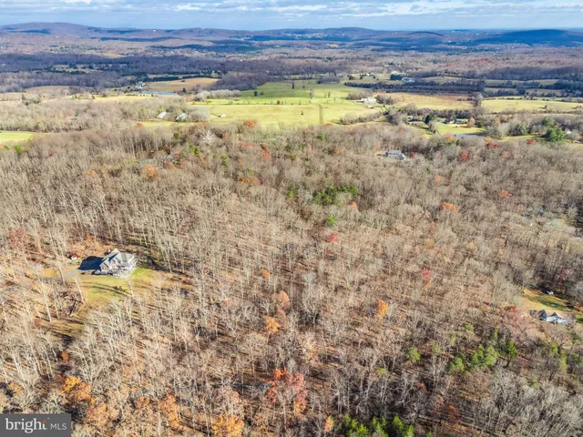 a view of a swimming pool and an outdoor space