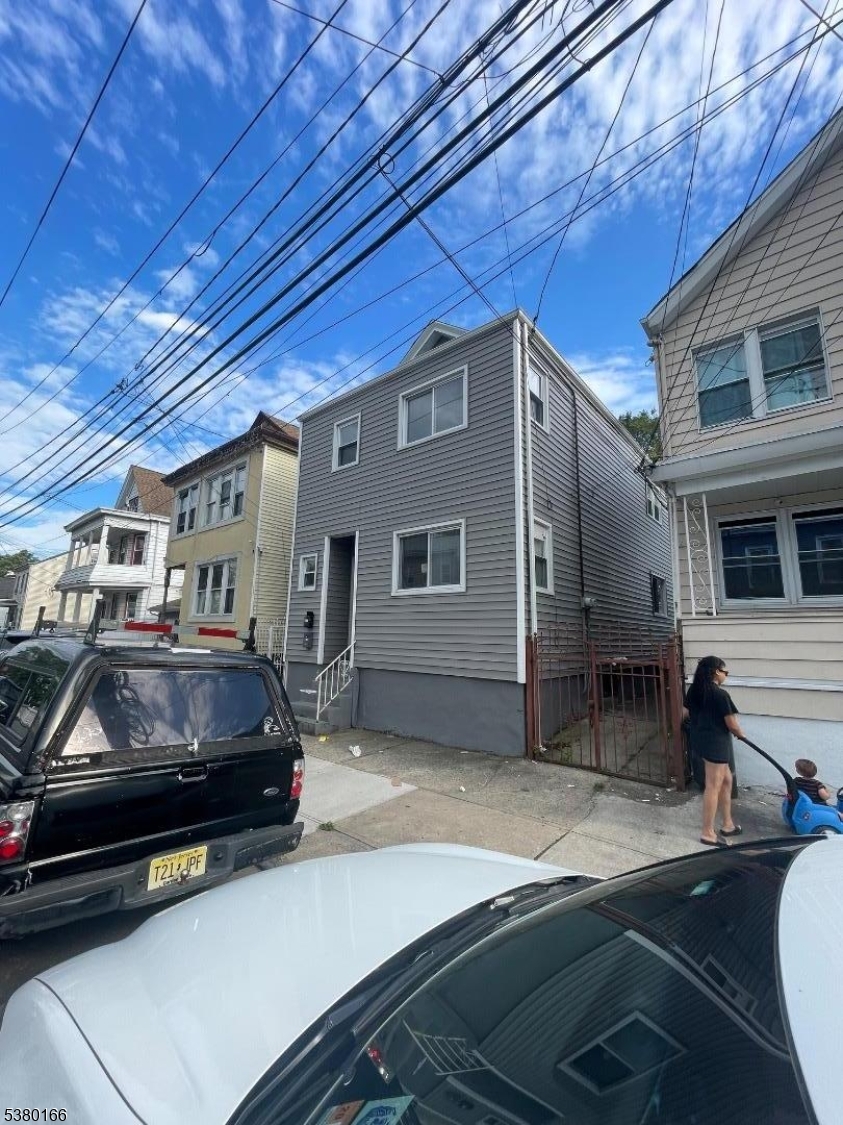 a car parked in front of garage