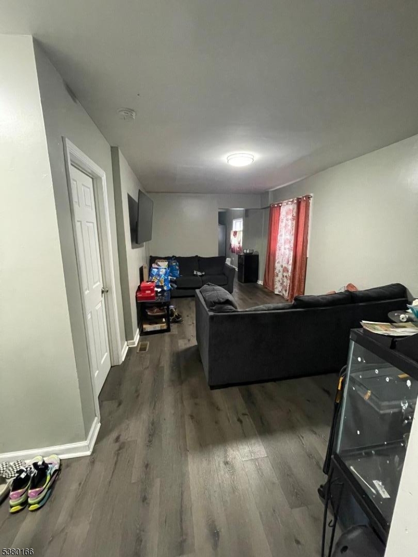 162 Lyon Street Paterson, NJ 07524 - Photo 15 of 25 a living room with furniture