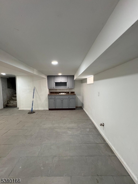 162 Lyon Street Paterson, NJ 07524 - Photo 4 of 25 a big room with closet and windows