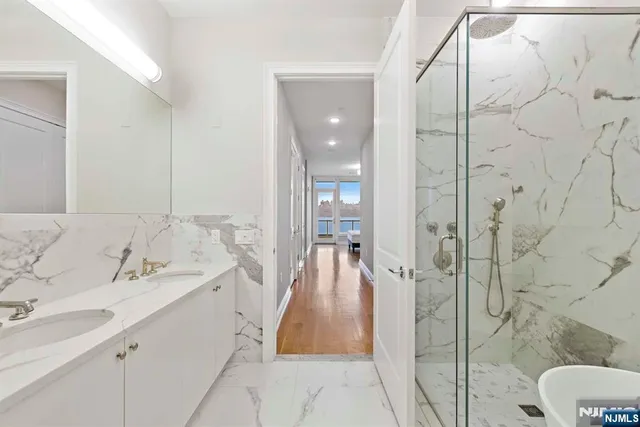 a bathroom with a sink and mirror