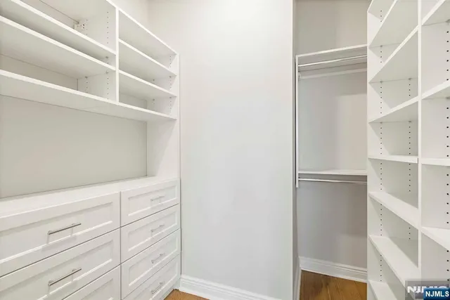 a view of an empty walk in closet