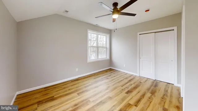 a view of a room with a hallway
