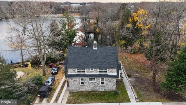 a view of a room with wooden floor and stairs