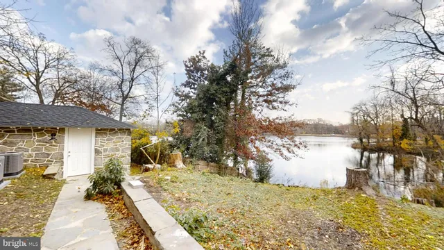 a view of empty room with white walls