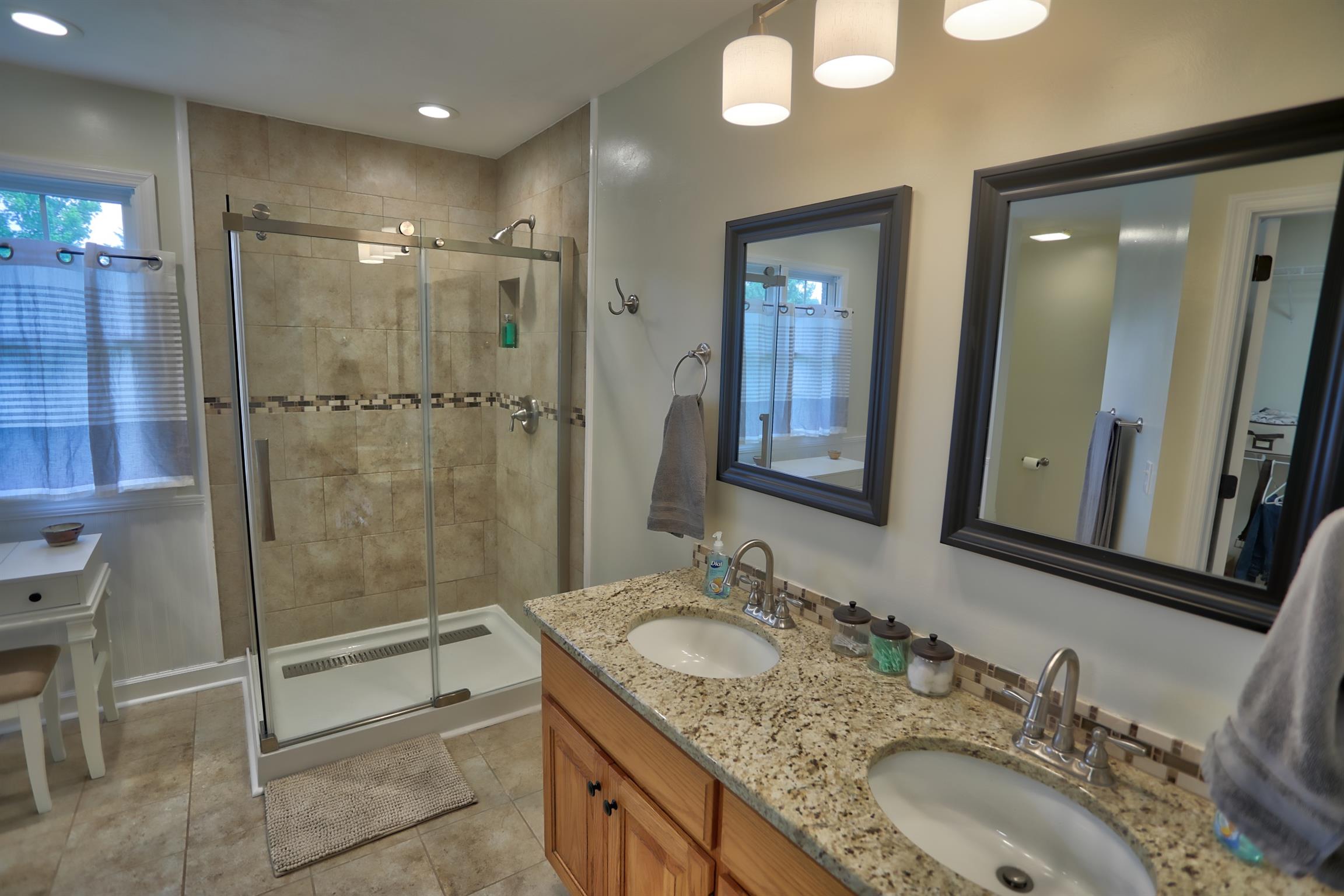 7288 Old Franklin Road Fairview, TN 37062 - Photo 13 of 30 Newly renovated master bath with double vanities and walk in closet.