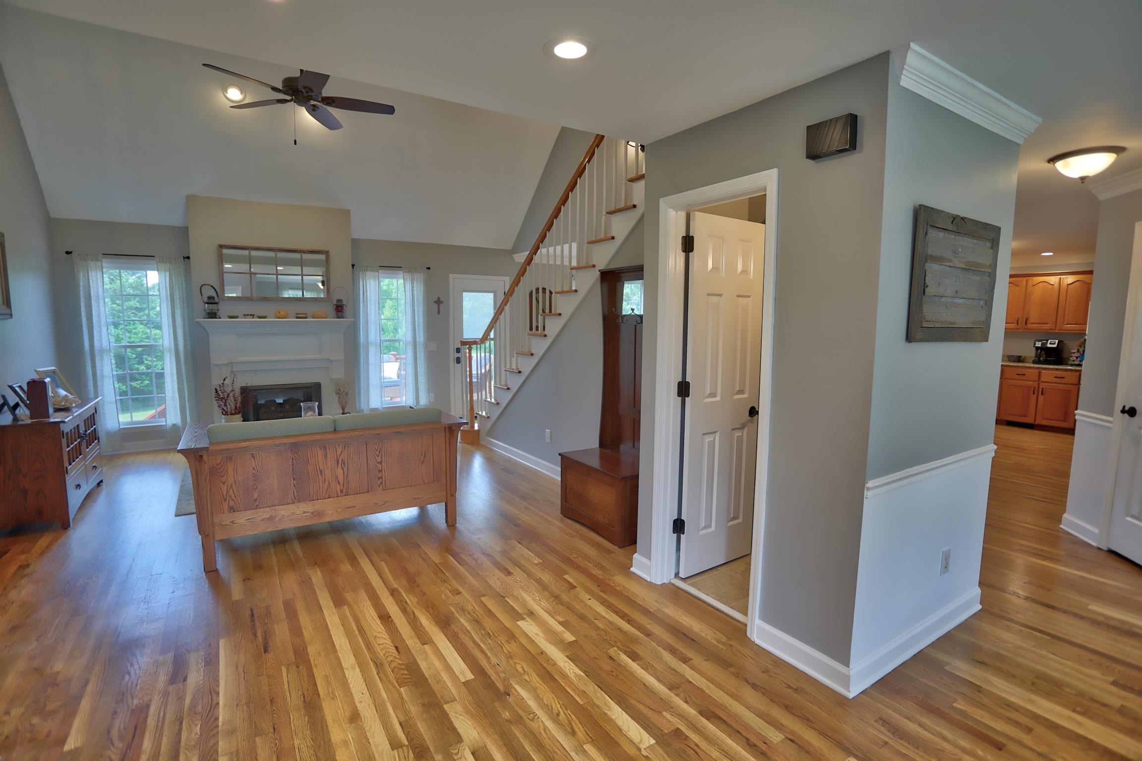 7288 Old Franklin Road Fairview, TN 37062 - Photo 9 of 30 View from front door. Living room has a gas fireplace and half bath.