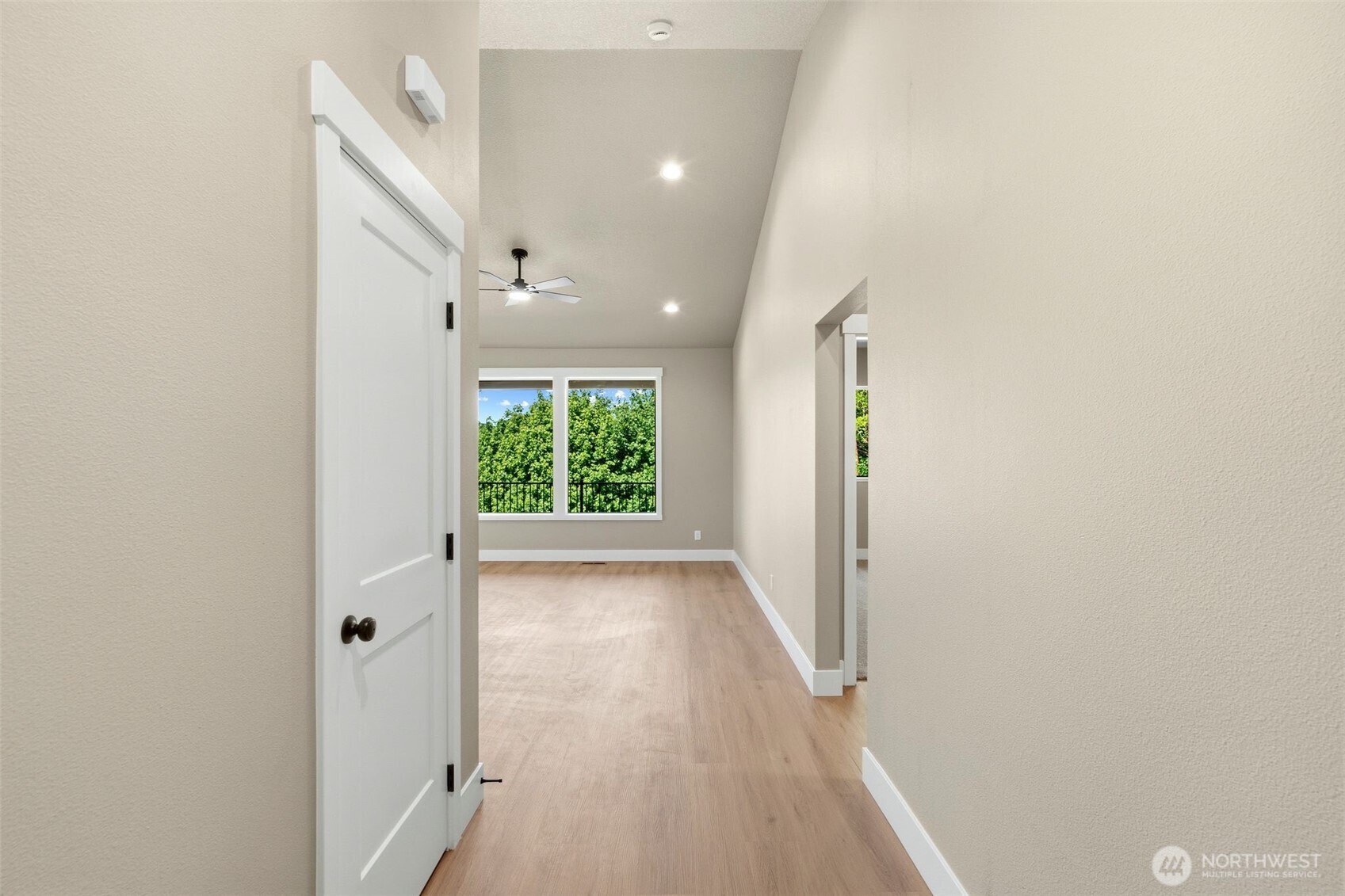 254 Windy Ridge Drive Longview, WA 98632 - Photo 7 of 27 wooden floor in an empty room with a window