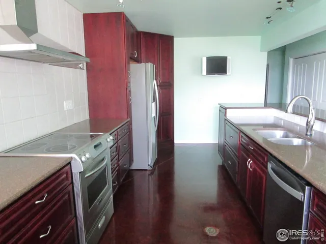 a bathroom with a sink a vanity and a mirror