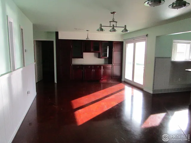 a view of a room with furniture and a fireplace