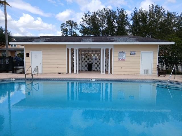 1583 Northwest 29 Road, Unit 2 Gainesville, FL 32605 - Photo 14 of 20 front view of house with yard