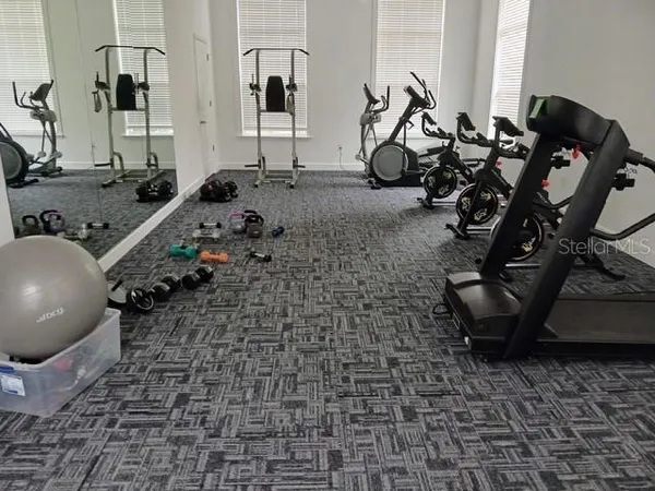 a view of a room with gym equipment