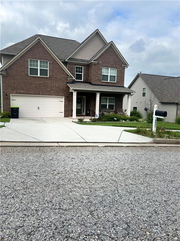5531 Valley Loop Fairburn, GA 30213 - Photo 1 of 1 a front view of a house with a yard