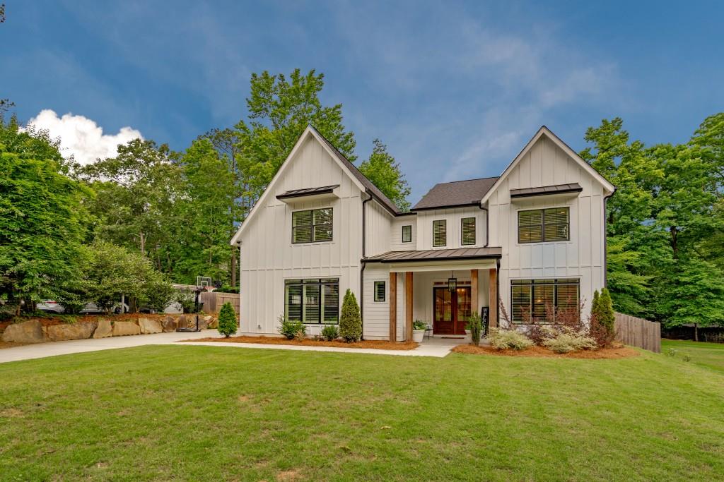 3666 Fortingale Road Atlanta, GA 30341 - Photo 1 of 1 a view of a house with a yard and sitting area