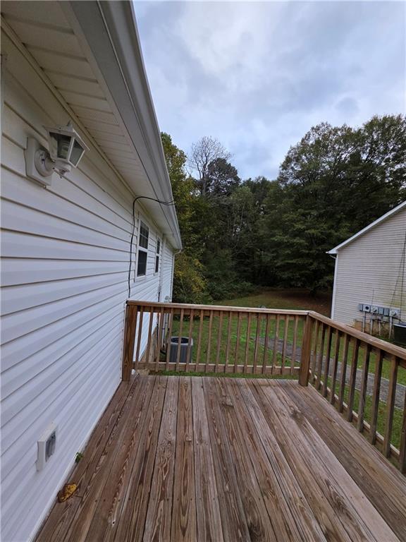 2325 Shady Grove Road, Unit A Carrollton, GA 30116 - Photo 24 of 42 a view of balcony with wooden floor and fence