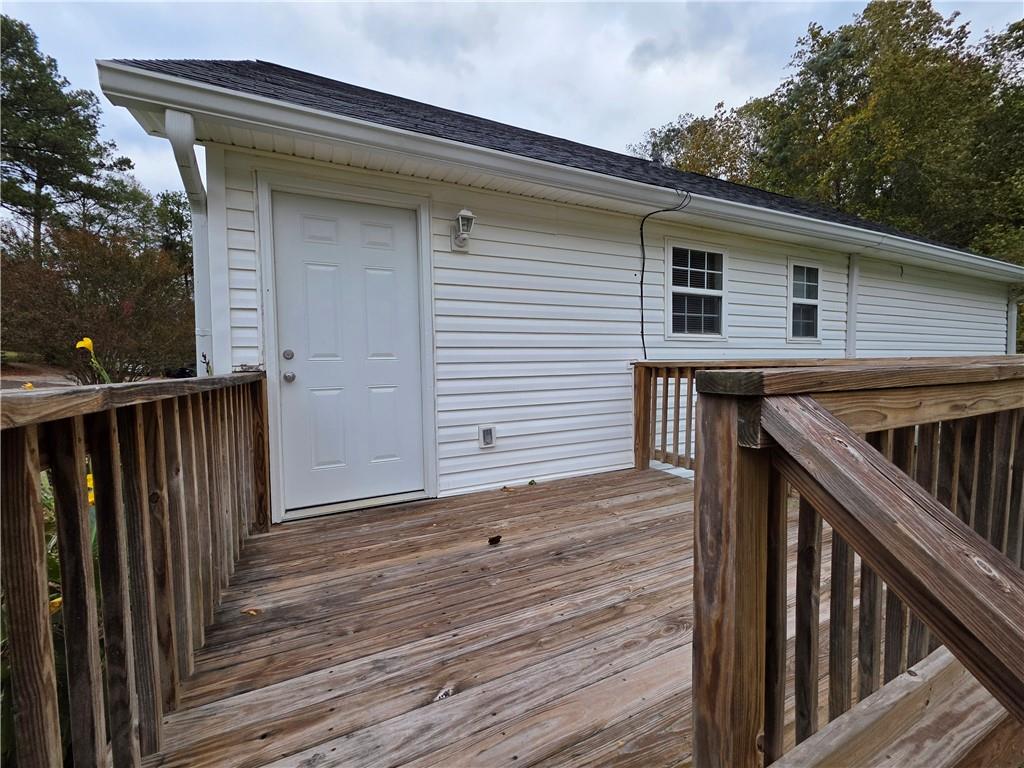 2325 Shady Grove Road, Unit A Carrollton, GA 30116 - Photo 25 of 42 a view of a house with wooden deck
