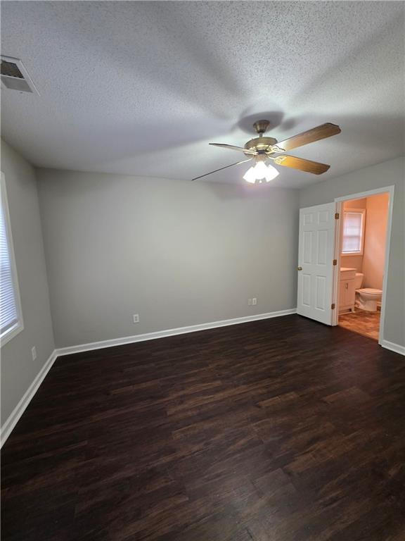 2325 Shady Grove Road, Unit A Carrollton, GA 30116 - Photo 35 of 42 a view of an empty room with wooden floor and a window