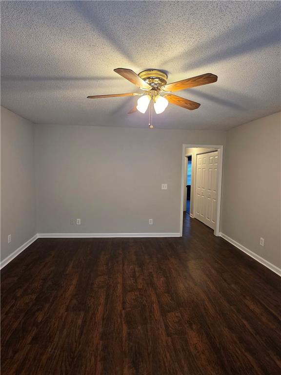 2325 Shady Grove Road, Unit A Carrollton, GA 30116 - Photo 5 of 42 wooden floor in an empty room