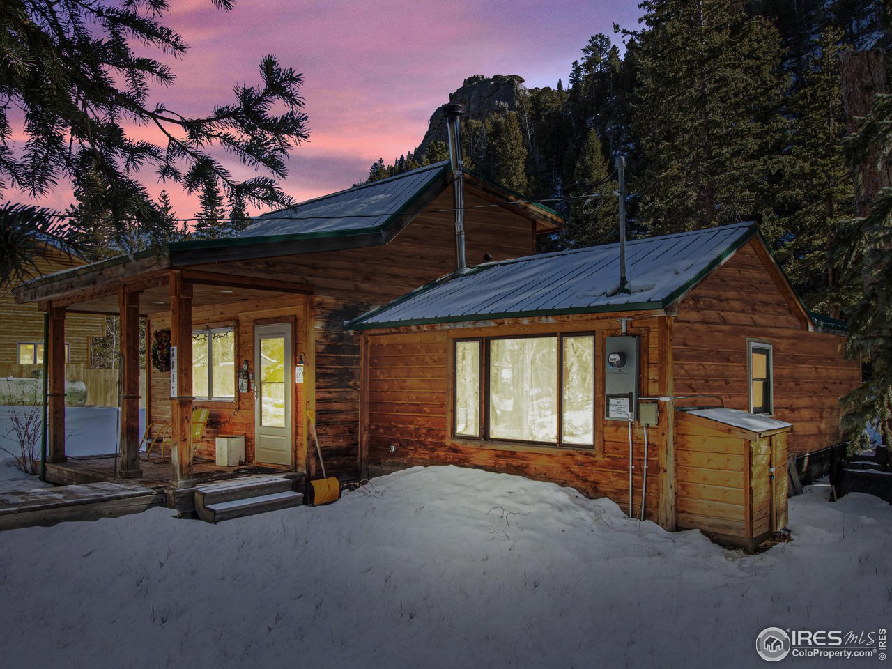 2817 Riverside Drive Lyons, CO 80540 - Photo 21 of 27 cabin at twilight