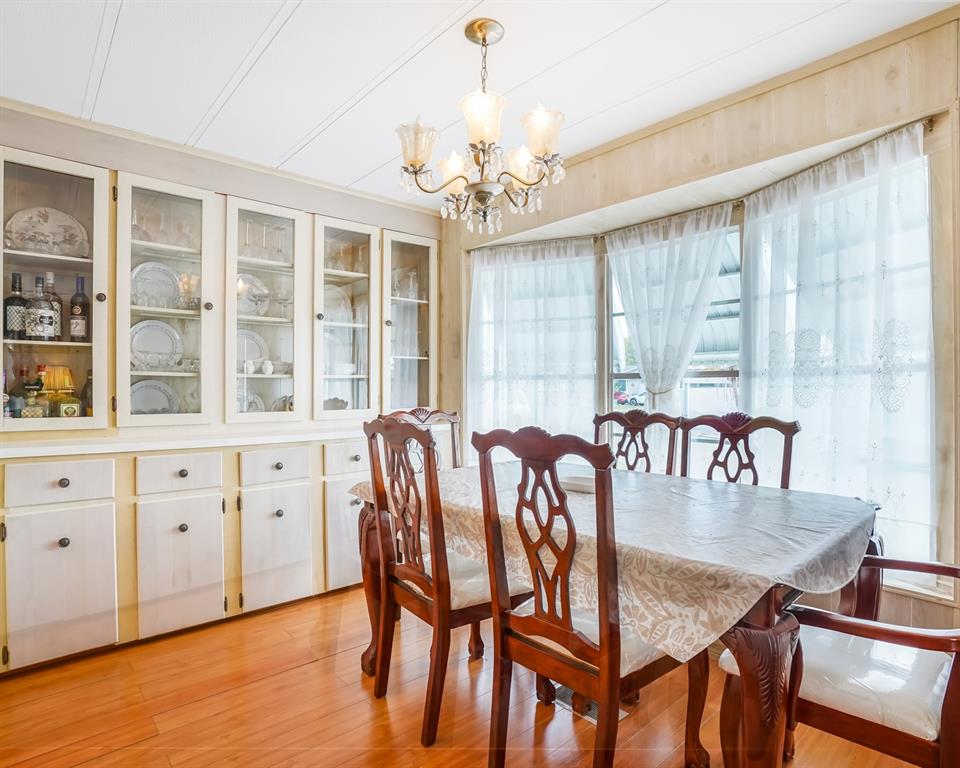 8517 Southwest 16th Place Davie, FL 33324 - Photo 3 of 28 a view of a dining room with furniture window and wooden floor