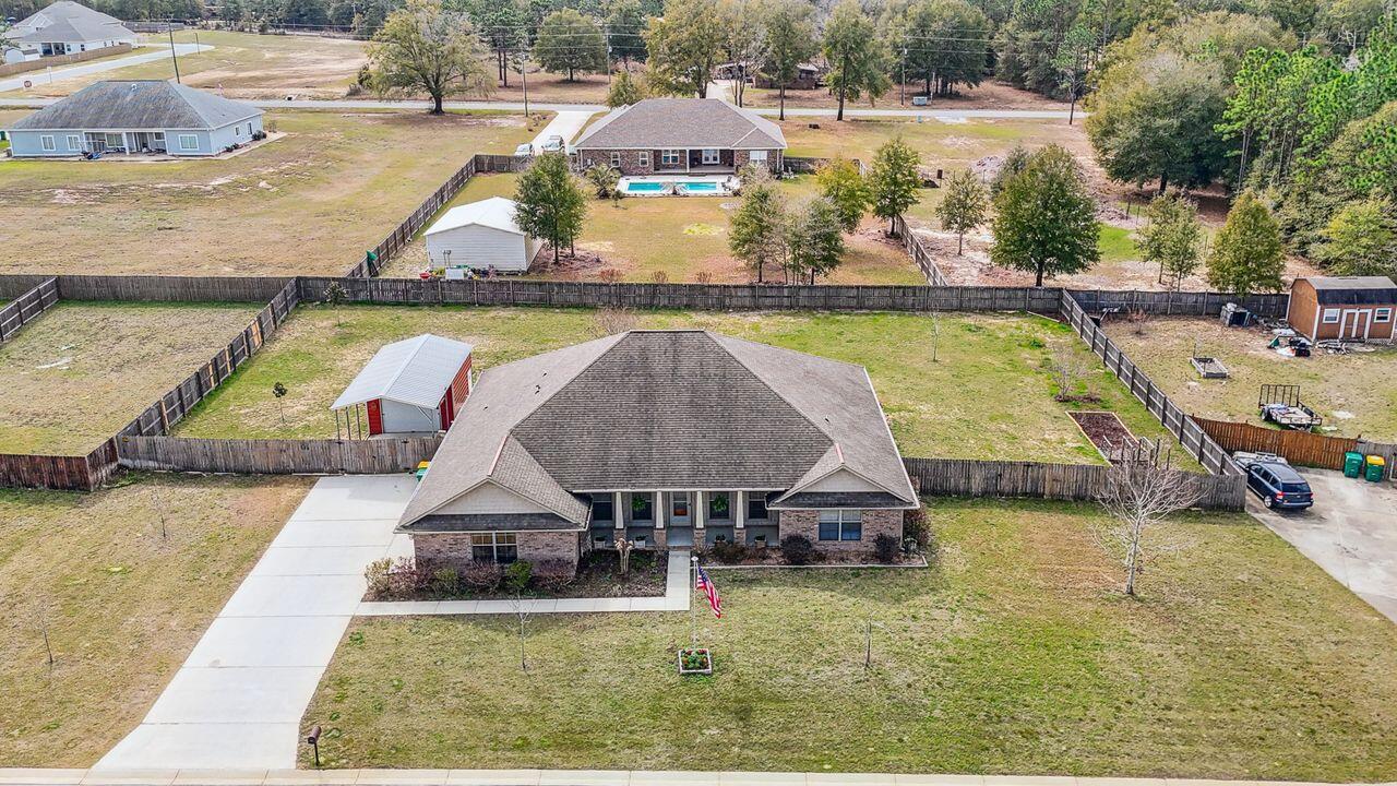 6256 Evan Circle Crestview, FL 32536 - Photo 40 of 46 an aerial view of a house with swimming pool