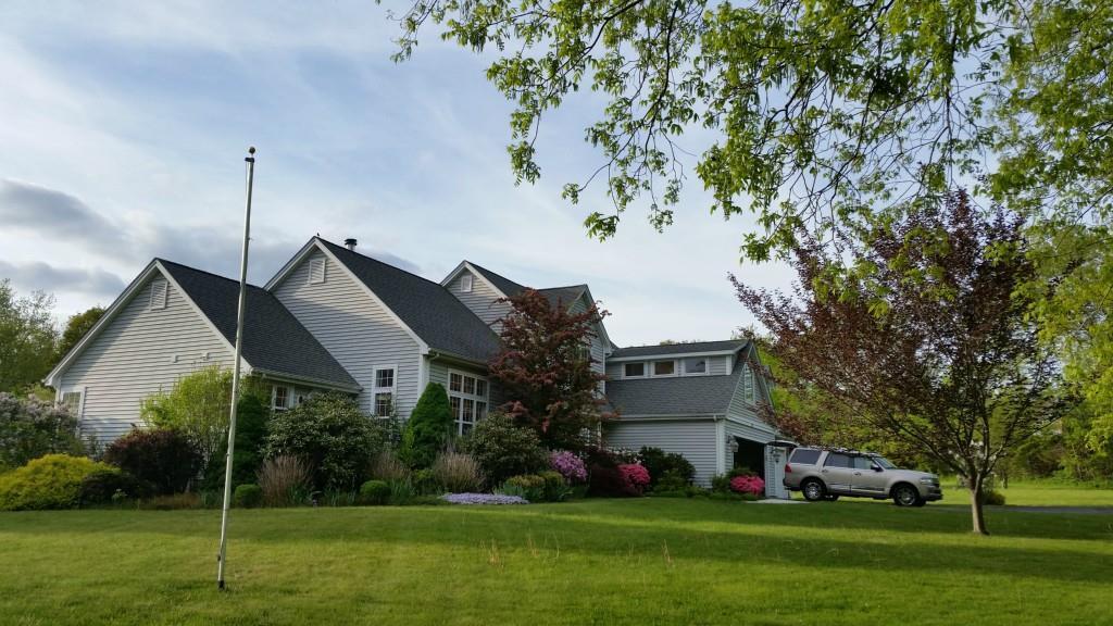 39 Chester Main Road North Stonington, CT 06359 - Photo 1 of 1 a front view of house with garden