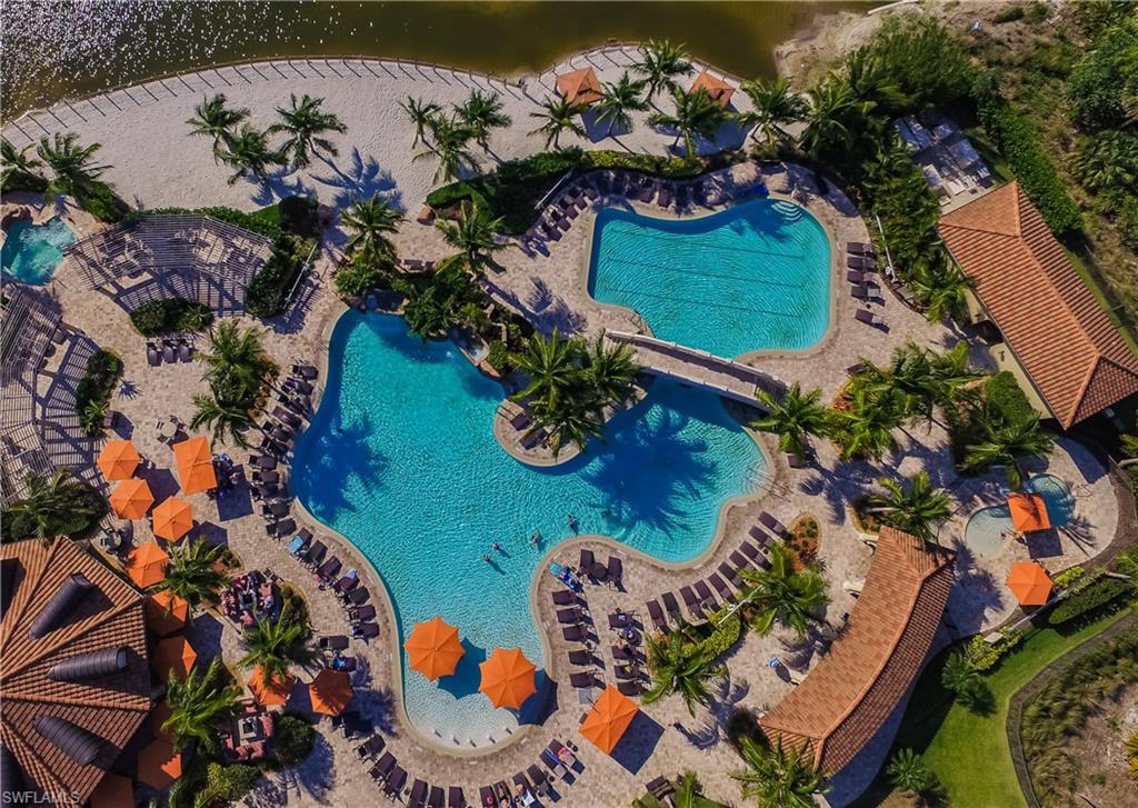 9474 Piacere Way Naples, FL 34113 - Photo 15 of 17 an aerial view of a dining table with chairs