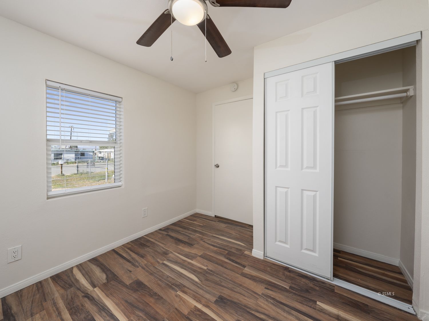 419 West Haloid Avenue Ridgecrest, CA 93555 - Photo 14 of 29 a view of empty room with wooden floor