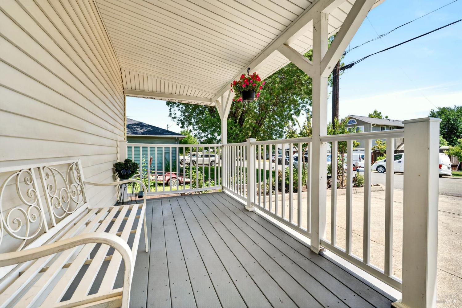 92 Oak Knoll Road Ukiah, CA 95482 - Photo 4 of 35 a balcony with wooden floor