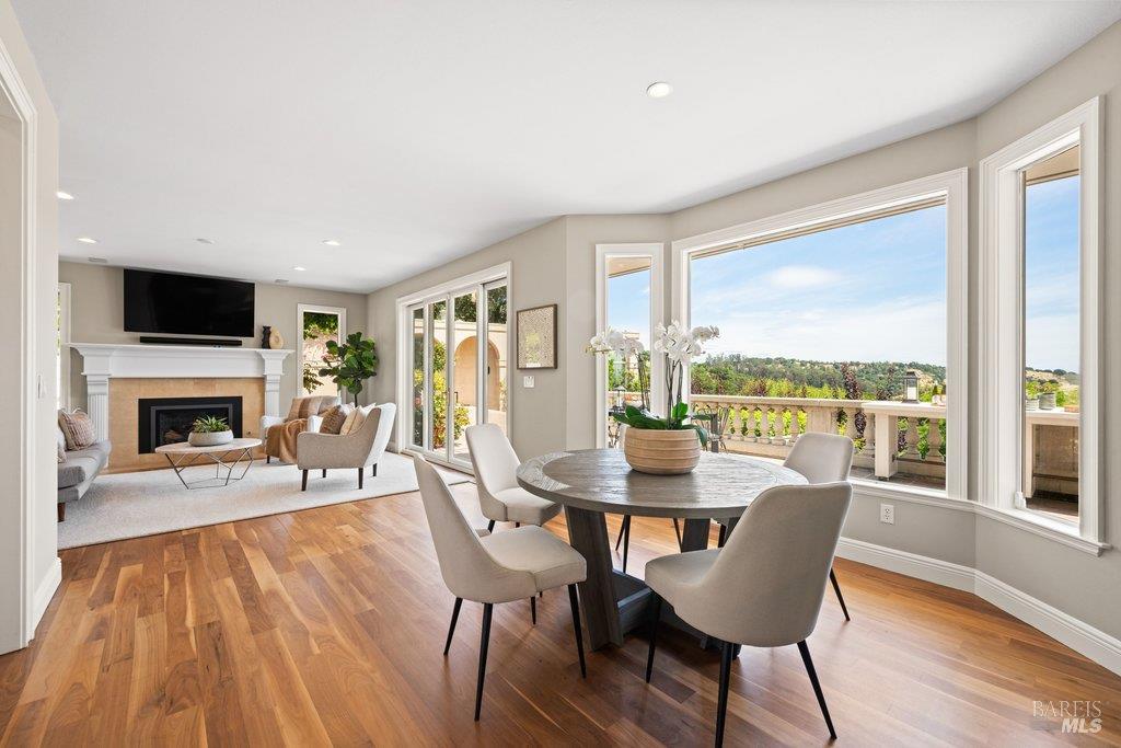 82 McNear Drive San Rafael, CA 94901 - Photo 24 of 54 a dining room with furniture window and wooden floor