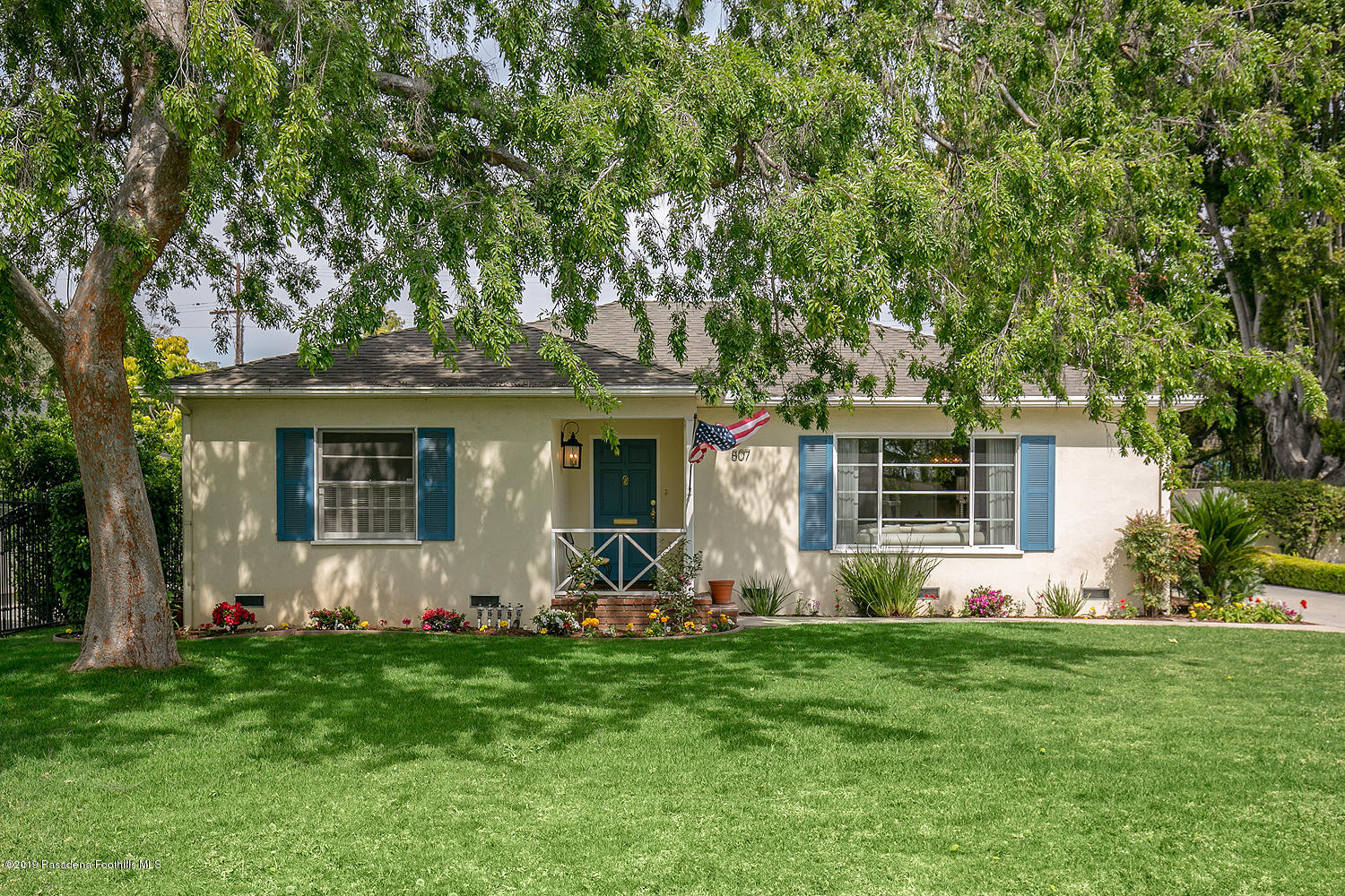 807 West Roses Road San Gabriel, CA 91775 - Photo 1 of 17 a front view of a house with garden