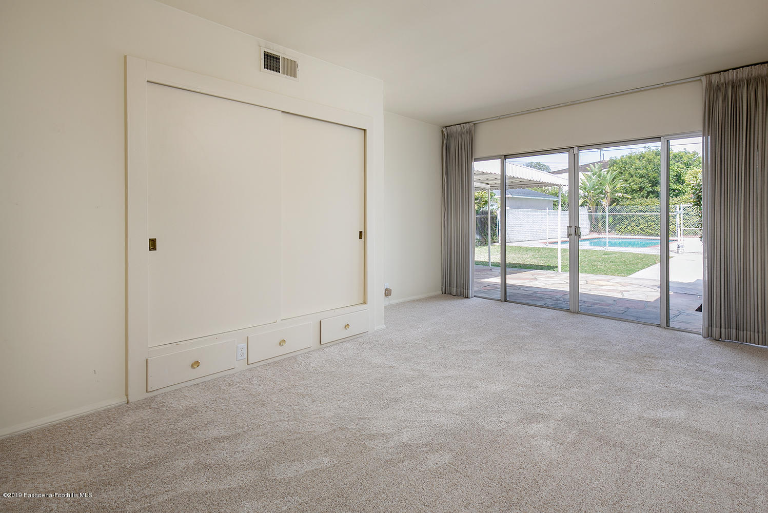 807 West Roses Road San Gabriel, CA 91775 - Photo 11 of 17 a view of an empty room with a window