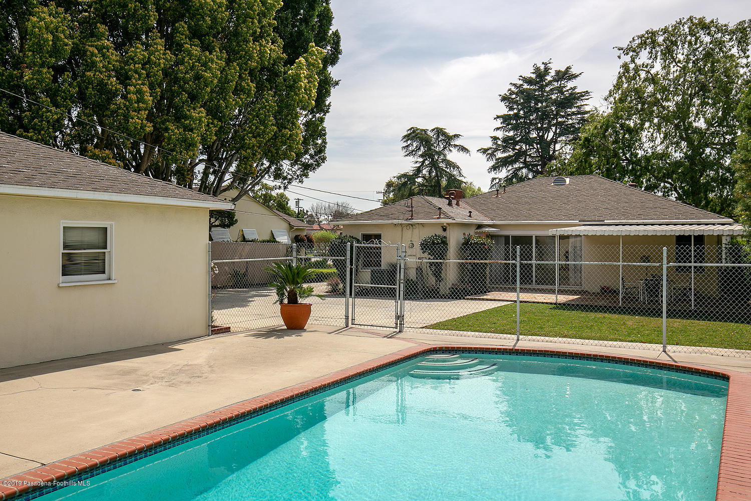 807 West Roses Road San Gabriel, CA 91775 - Photo 15 of 17 a view of a house with swimming pool and porch