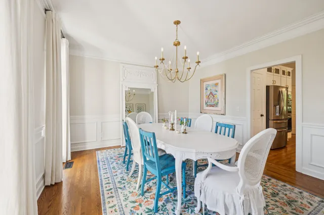 a bedroom with bed and windows