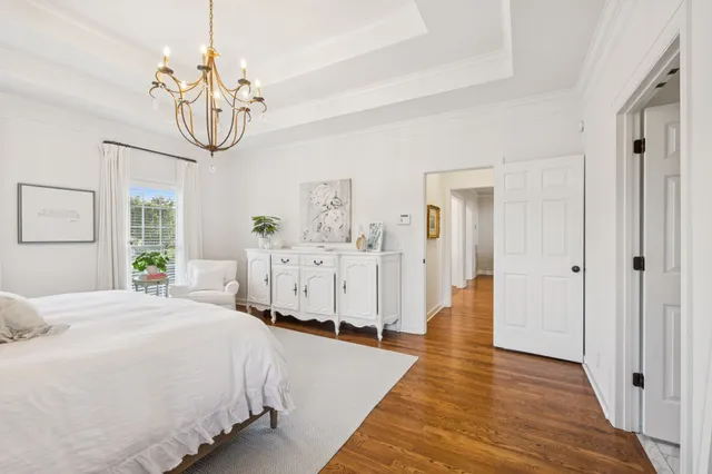 a bathroom with a granite countertop sink mirror and shower
