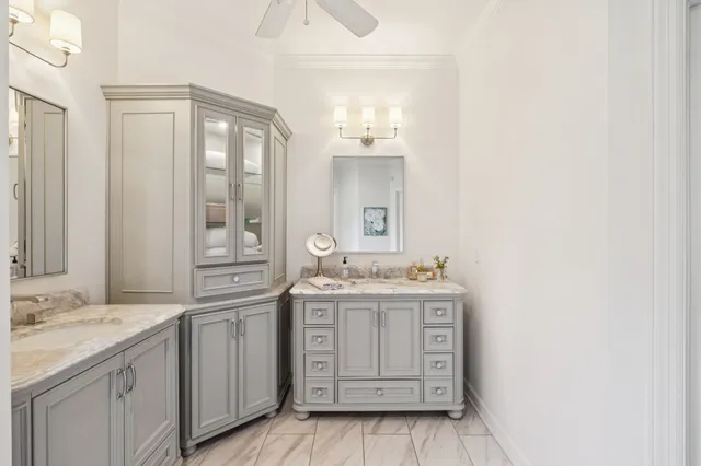a kitchen with a refrigerator and a stove