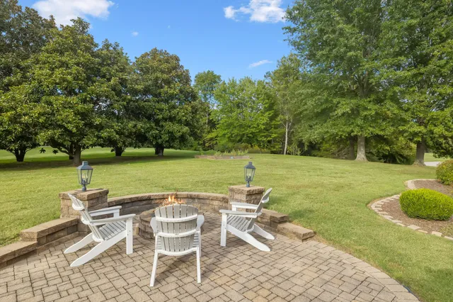 a view of a back yard from a balcony
