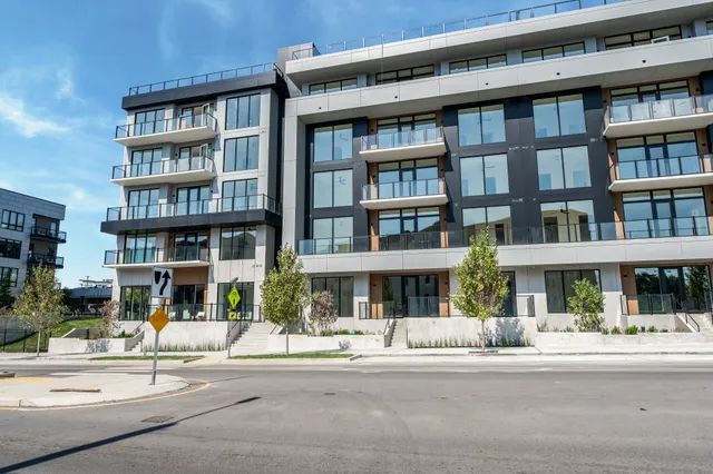 a front view of a building with street view