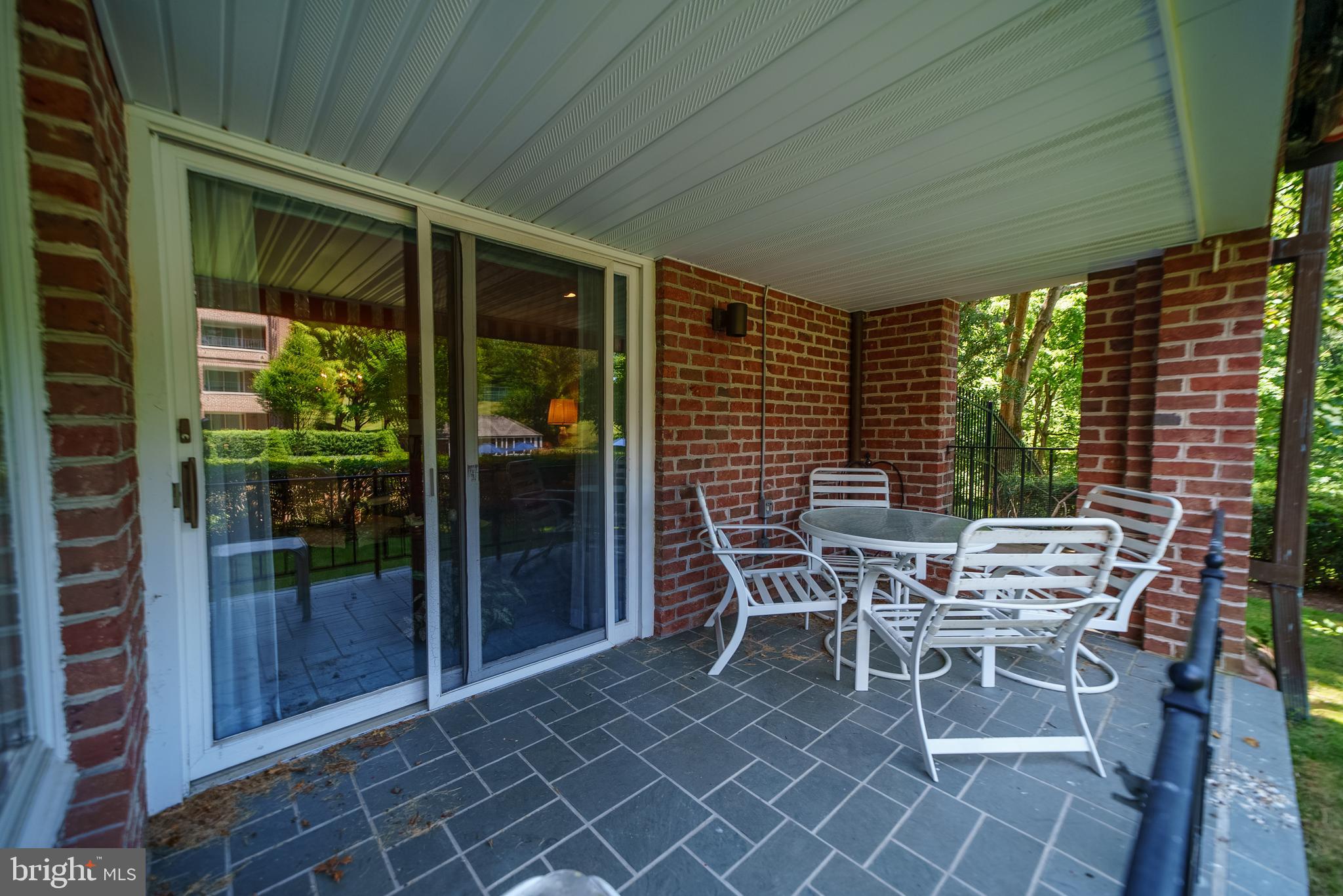 2331 Old Court Road, Unit 111 Baltimore, MD 21208 - Photo 20 of 71 Covered Patio off of Living Room (Overlooks Pool)