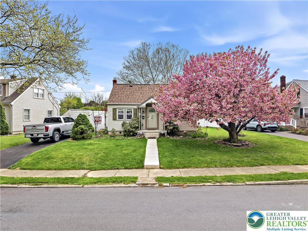 115 North Liberty Street Nazareth, PA 18064 - Photo 2 of 27 a front view of a house with a yard and trees
