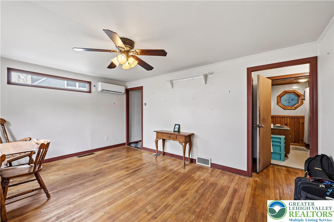 115 North Liberty Street Nazareth, PA 18064 - Photo 7 of 27 a view of workspace with wooden floor and ceiling fan
