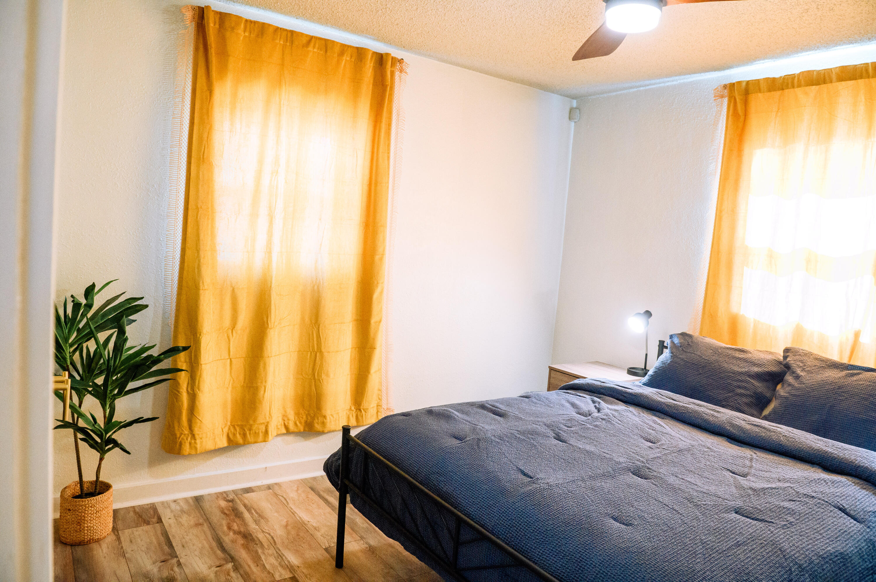 2436 24th Street, Unit FRONT Lubbock, TX 79411 - Photo 12 of 24 a bedroom with a bed and a window