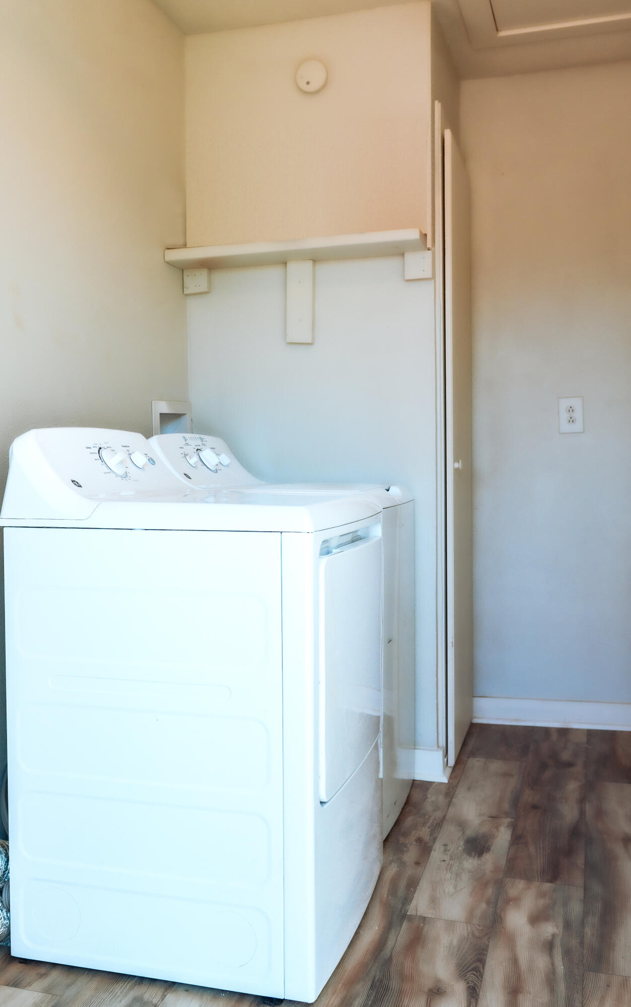 2436 24th Street, Unit FRONT Lubbock, TX 79411 - Photo 22 of 24 a utility room with dryer and washer