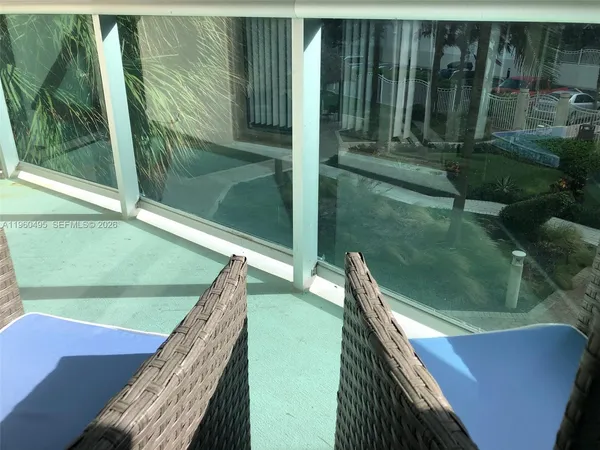 a kitchen with stainless steel appliances granite countertop a sink and a stove