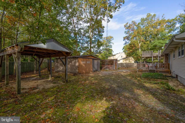 a balcony with table and chairs