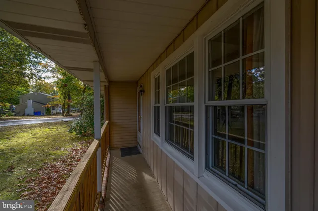 a view of swimming pool from a balcony