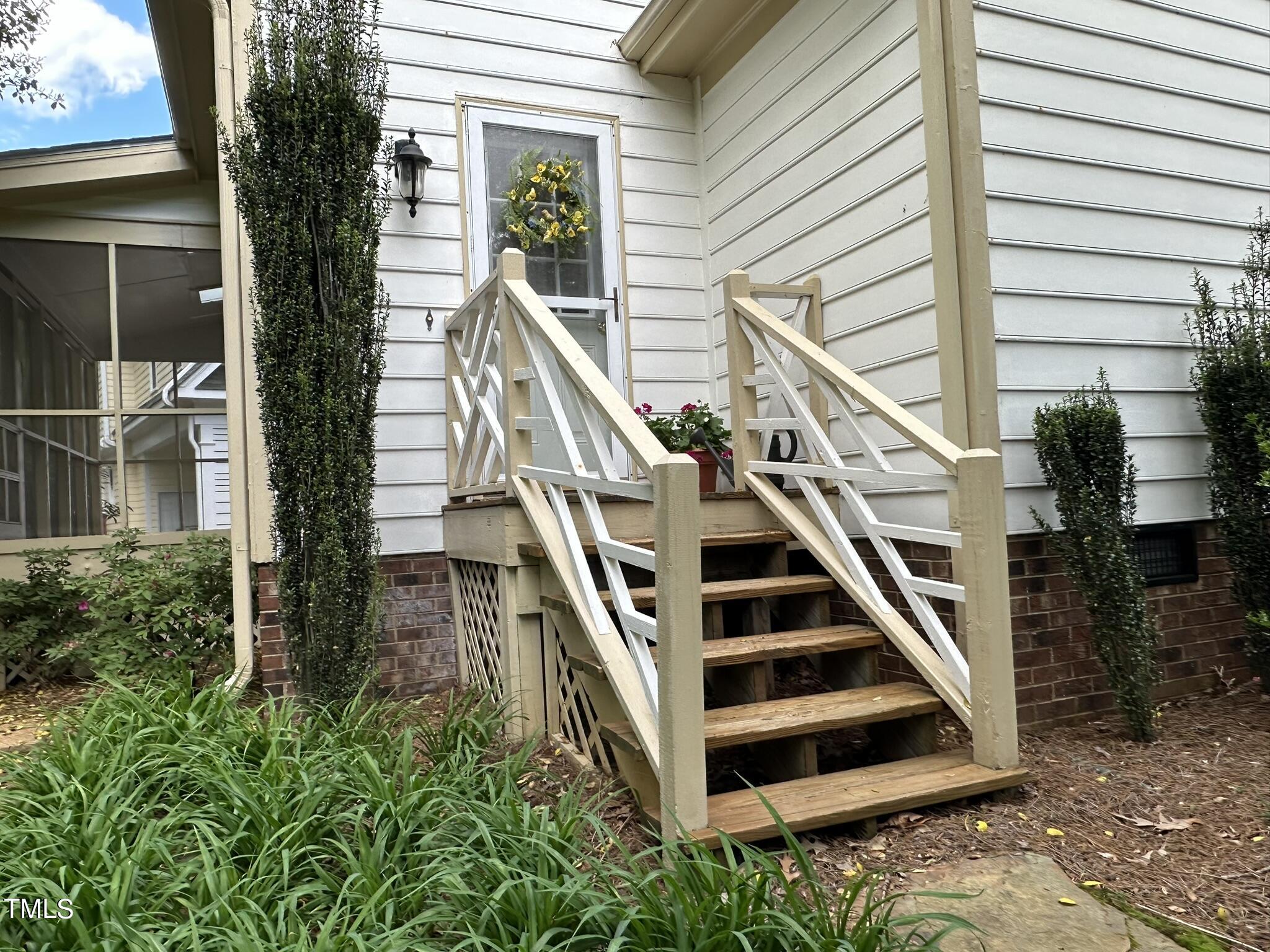 7805 Highlandview Circle Raleigh, NC 27613 - Photo 26 of 33 a view of entryway with a front door