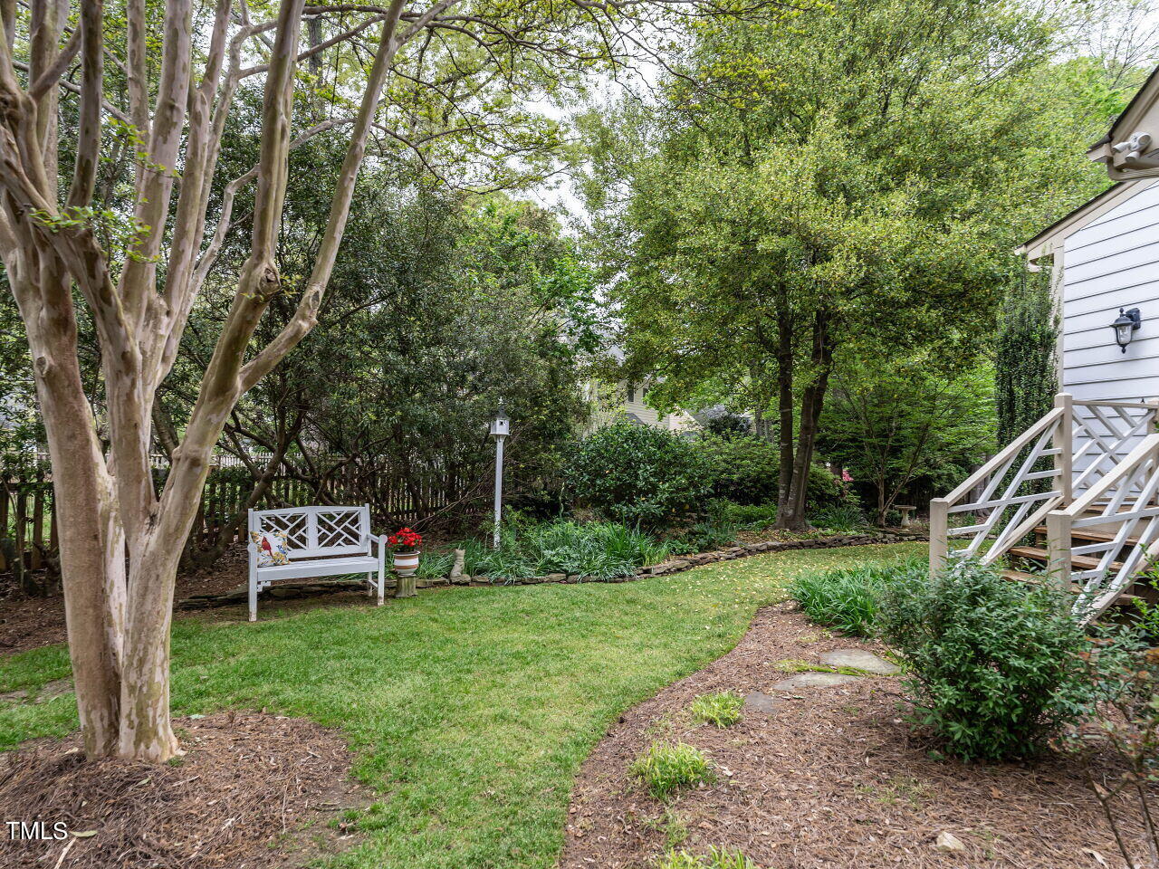 7805 Highlandview Circle Raleigh, NC 27613 - Photo 27 of 33 a view of a garden with sitting area