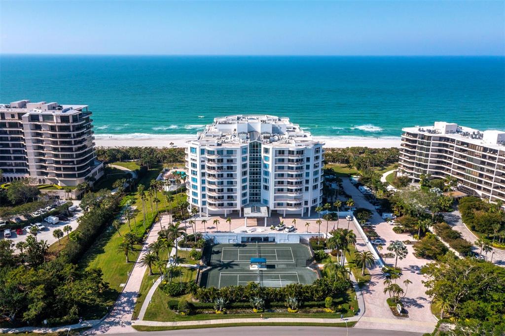 455 Longboat Club Road, Unit 402 Longboat Key, FL 34228 - Photo 40 of 48 a view of building with outdoor space