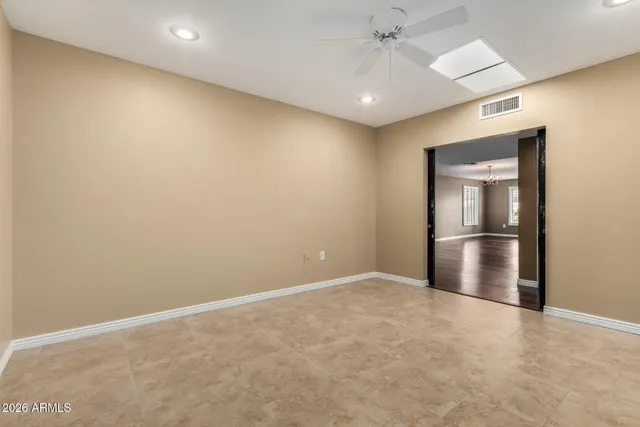 a view of storage and utility room with closet